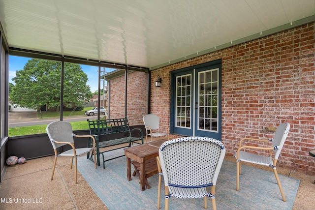 sunroom featuring french doors