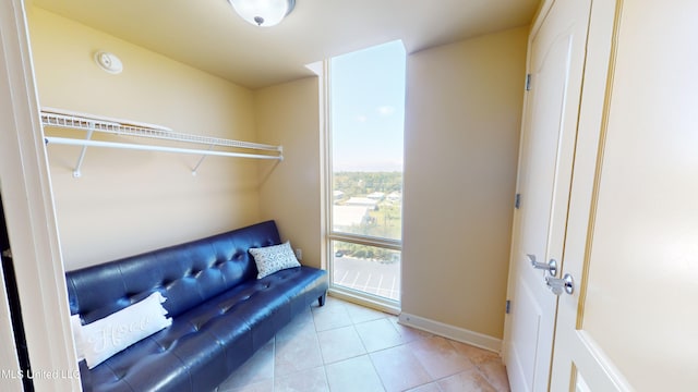 sitting room featuring light tile patterned floors