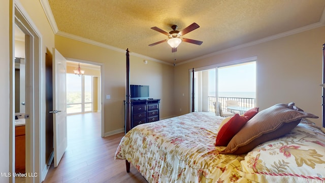 bedroom featuring ornamental molding, a textured ceiling, wood-type flooring, and ceiling fan