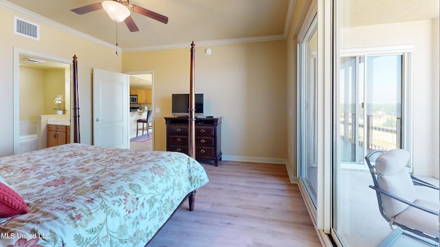 bedroom featuring crown molding, ensuite bathroom, light wood-type flooring, and ceiling fan