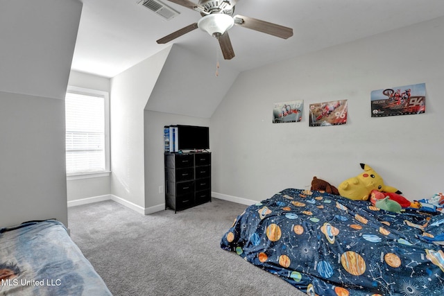 carpeted bedroom with ceiling fan and lofted ceiling