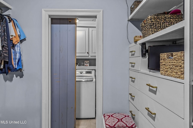 kitchen featuring white cabinets, washer / clothes dryer, and open shelves