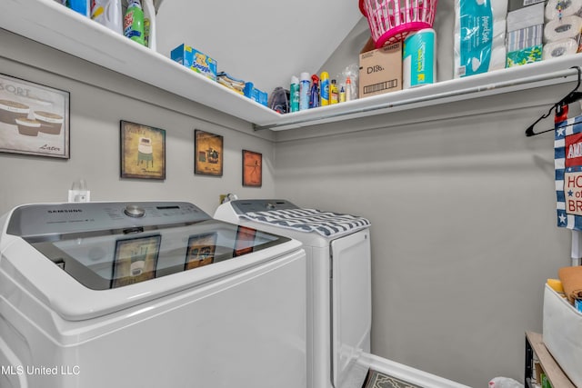 clothes washing area featuring washing machine and clothes dryer