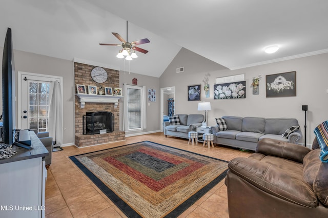 living room featuring ceiling fan, light tile patterned floors, a fireplace, and lofted ceiling