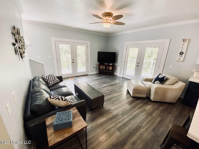 living room with ornamental molding, french doors, dark wood finished floors, and ceiling fan