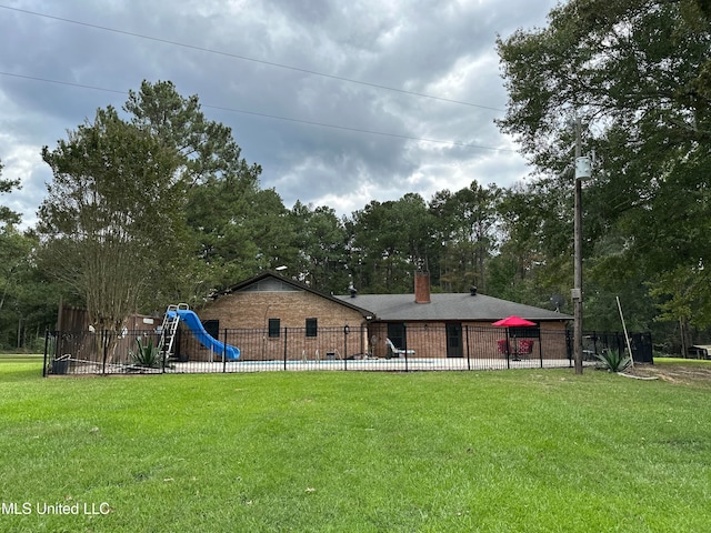 view of yard featuring a playground