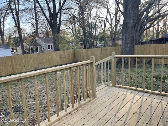 deck featuring a fenced backyard