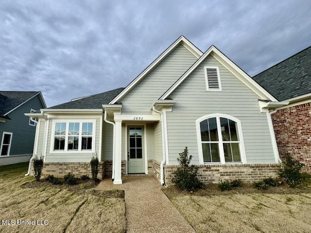 2892 Market Square Ave, Southaven, MS 38672 - view of front facade with roof with shingles and brick siding