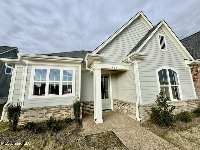 2892 Market Square Ave, Southaven, MS 38672 - view of front of property featuring brick siding and a shingled roof