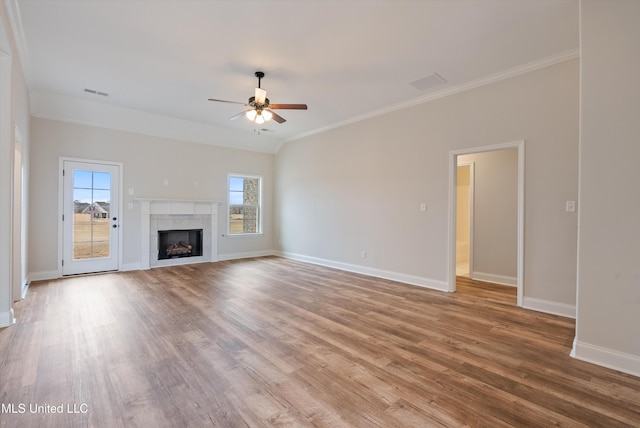 3786 Roland Dr, Southaven, MS 38672 - unfurnished living room featuring visible vents, a wealth of natural light, ceiling fan, and wood finished floors