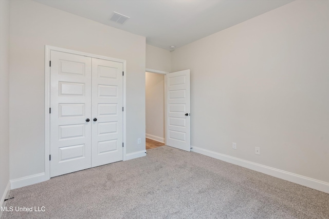 3786 Roland Dr, Southaven, MS 38672 - unfurnished bedroom with visible vents, baseboards, a closet, and carpet