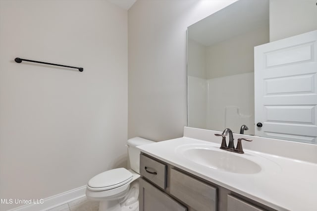 3786 Roland Dr, Southaven, MS 38672 - bathroom featuring tile patterned floors, vanity, baseboards, and toilet