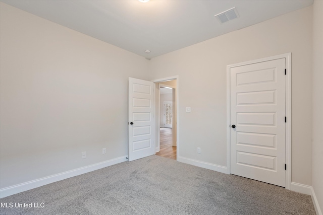 3786 Roland Dr, Southaven, MS 38672 - unfurnished bedroom with carpet floors, baseboards, and visible vents