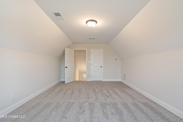 3786 Roland Dr, Southaven, MS 38672 - bonus room featuring visible vents, baseboards, lofted ceiling, and carpet floors