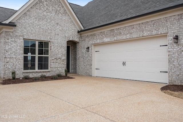3786 Roland Dr, Southaven, MS 38672 - view of front of house with brick siding, a shingled roof, a garage, and driveway