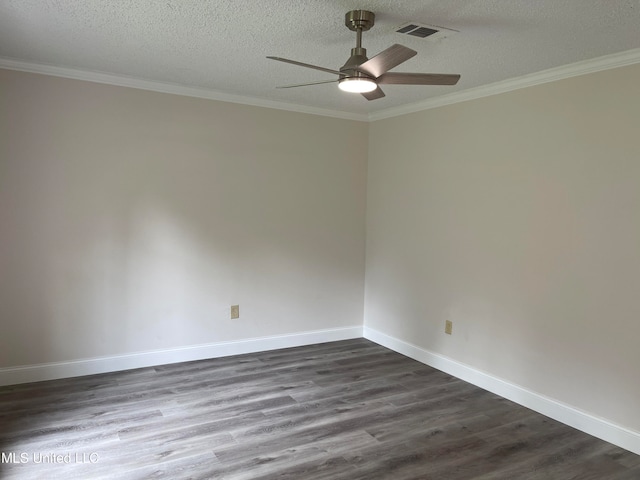 empty room featuring ornamental molding, a textured ceiling, dark wood-type flooring, and ceiling fan