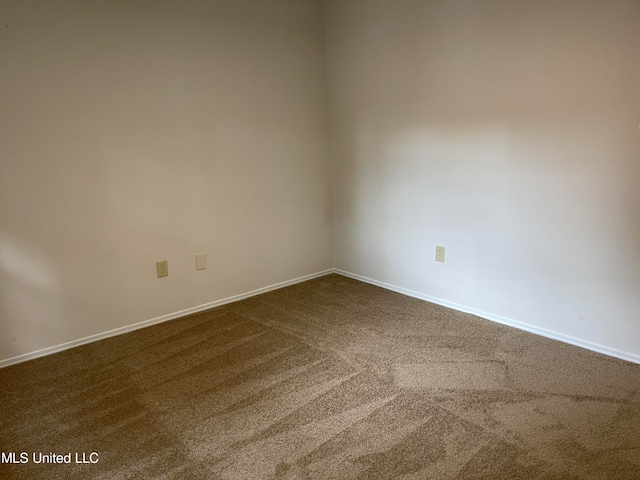 empty room with carpet floors