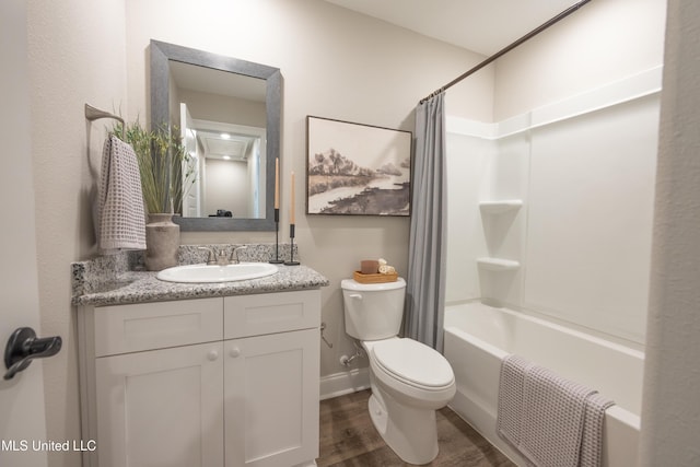 bathroom featuring shower / tub combo with curtain, vanity, toilet, and wood finished floors