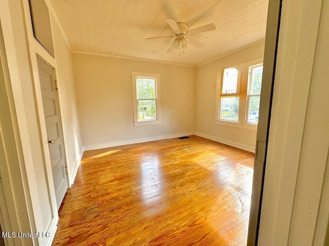 319 S 4th St, Mccomb, MS 39648 - spare room with ornamental molding, a ceiling fan, light wood-style flooring, and baseboards