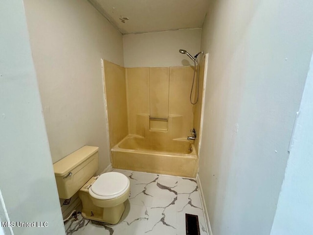 319 S 4th St, Mccomb, MS 39648 - full bath with toilet, marble finish floors, washtub / shower combination, and baseboards