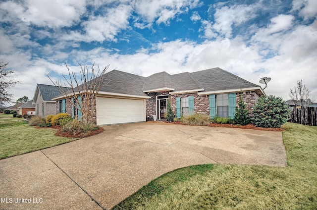 single story home featuring a garage and a front yard