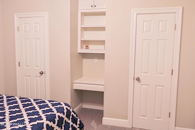 bedroom featuring carpet