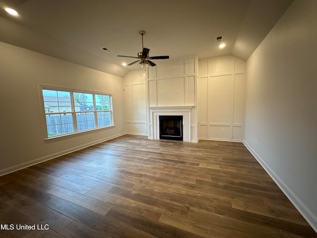 unfurnished living room with dark hardwood / wood-style floors, ceiling fan, and lofted ceiling