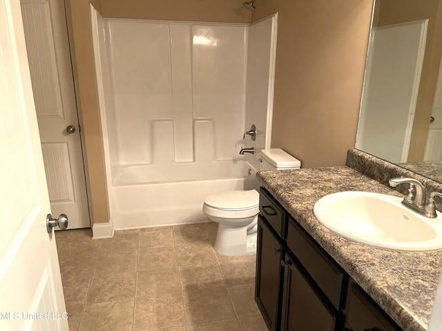 full bathroom with tile patterned flooring, vanity, shower / washtub combination, and toilet