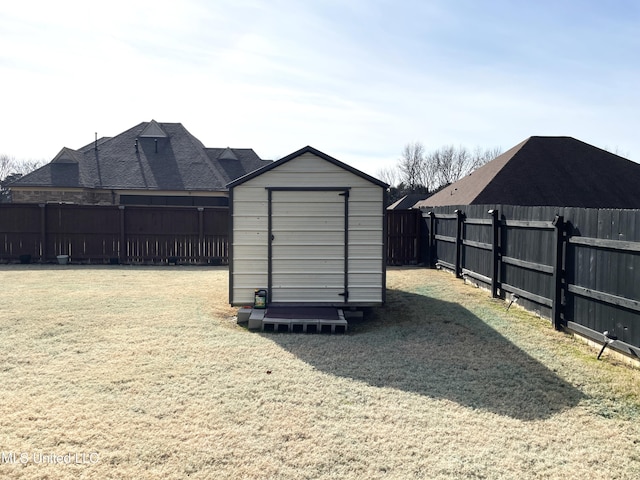 view of outbuilding featuring a yard