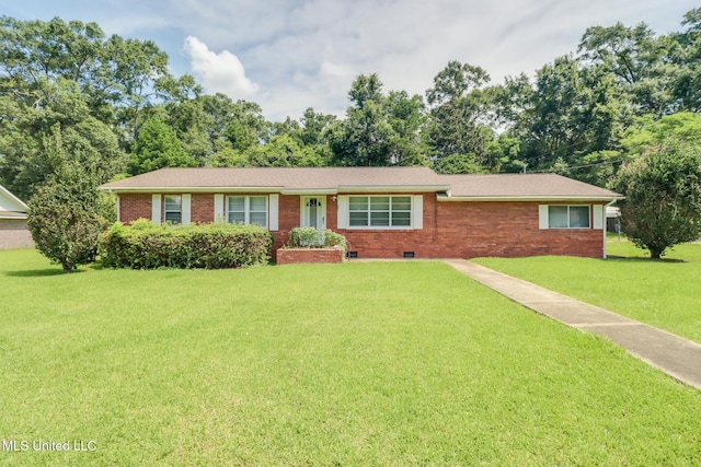 603 James Ave, Wiggins, MS 39577 - single story home featuring brick siding and a front yard