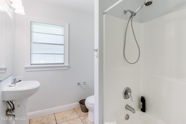 603 James Ave, Wiggins, MS 39577 - bathroom featuring shower / bathtub combination and tile patterned floors