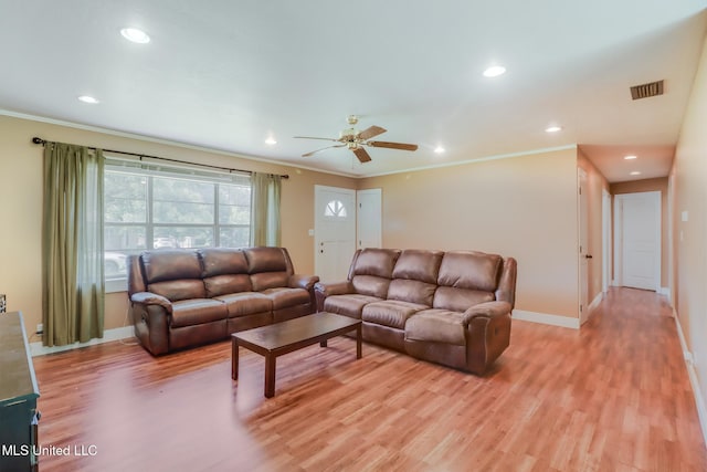 603 James Ave, Wiggins, MS 39577 - living area featuring crown molding, light wood-type flooring, ceiling fan, and recessed lighting