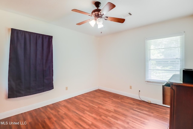 603 James Ave, Wiggins, MS 39577 - empty room featuring wood finished floors and ceiling fan