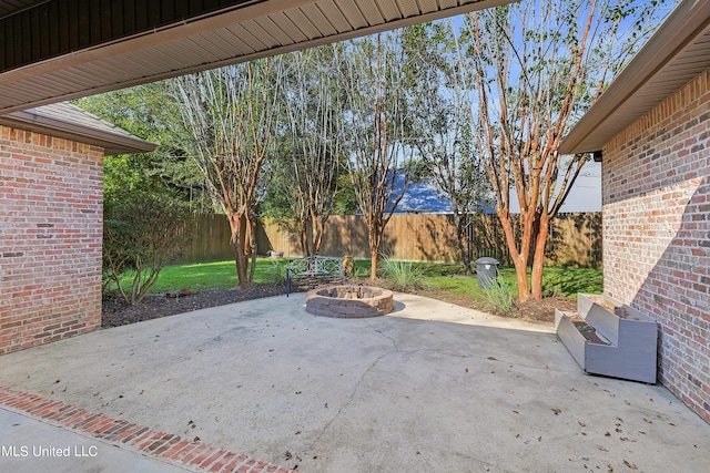 view of patio / terrace featuring a fire pit