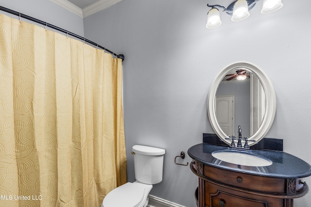 full bath featuring vanity, toilet, baseboards, and ornamental molding