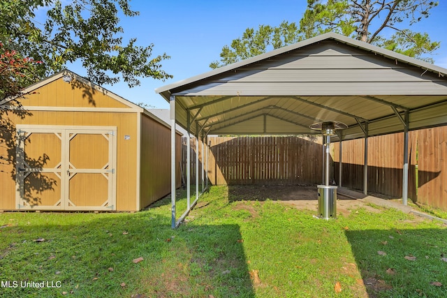 view of outdoor structure featuring a lawn and a carport