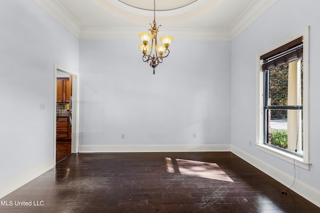 unfurnished room with a healthy amount of sunlight, an inviting chandelier, a raised ceiling, and dark hardwood / wood-style floors