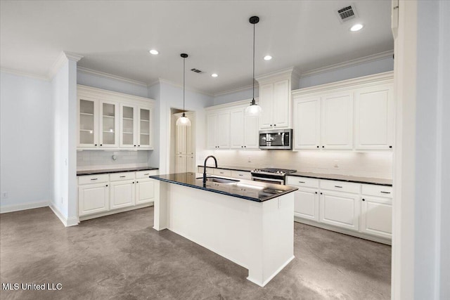 104 Glenwild Trl, Canton, MS 39046 - kitchen with stainless steel microwave, dark countertops, concrete floors, gas range oven, and tasteful backsplash