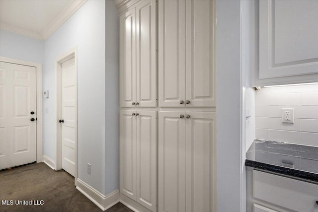 104 Glenwild Trl, Canton, MS 39046 - hall with ornamental molding and dark carpet