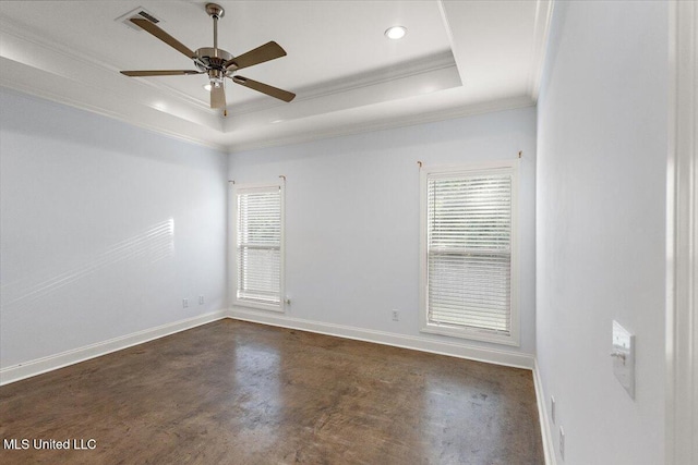 104 Glenwild Trl, Canton, MS 39046 - empty room with a raised ceiling, ornamental molding, a ceiling fan, recessed lighting, and concrete flooring