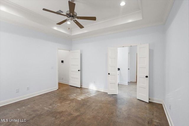 104 Glenwild Trl, Canton, MS 39046 - unfurnished room featuring ceiling fan, crown molding, a raised ceiling, recessed lighting, and finished concrete flooring
