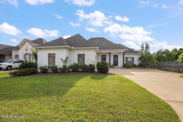 104 Glenwild Trl, Canton, MS 39046 - french country style house with concrete driveway