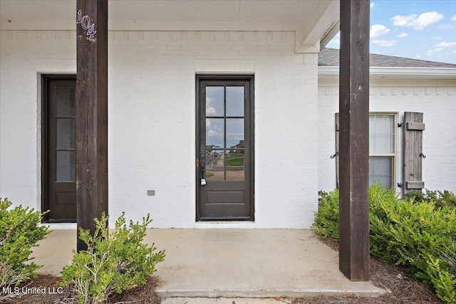 104 Glenwild Trl, Canton, MS 39046 - view of exterior entry with brick siding