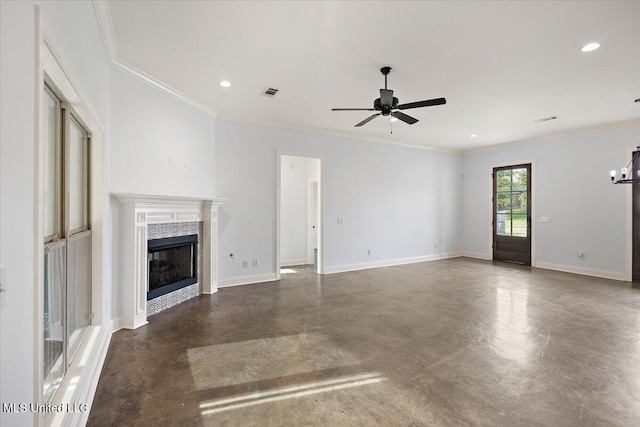 104 Glenwild Trl, Canton, MS 39046 - unfurnished living room featuring finished concrete floors, a tile fireplace, a ceiling fan, ornamental molding, and recessed lighting