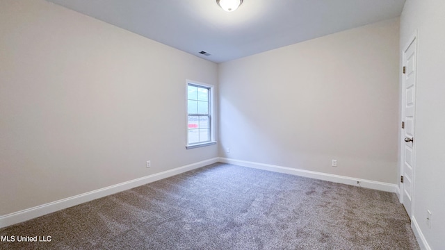 view of carpeted spare room