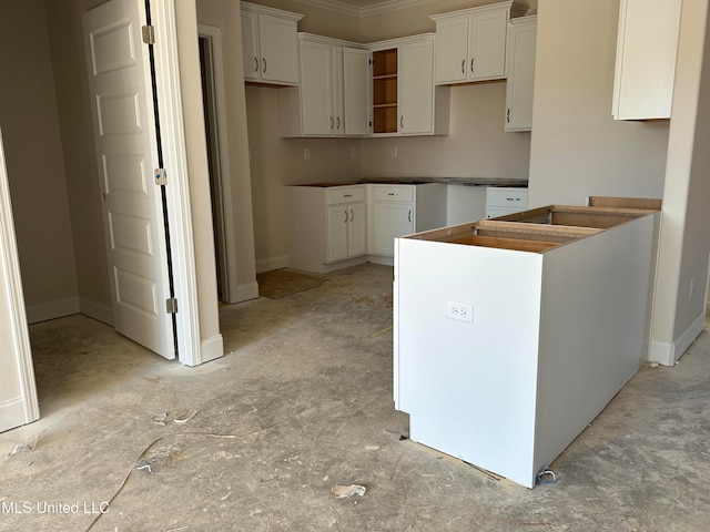 kitchen featuring white cabinetry