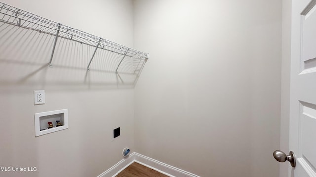 laundry room with hookup for a washing machine and hardwood / wood-style floors