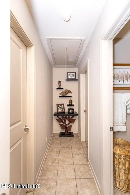 corridor featuring light tile patterned flooring