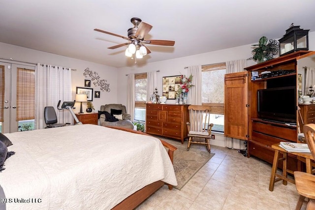 bedroom featuring ceiling fan, french doors, and light tile patterned floors