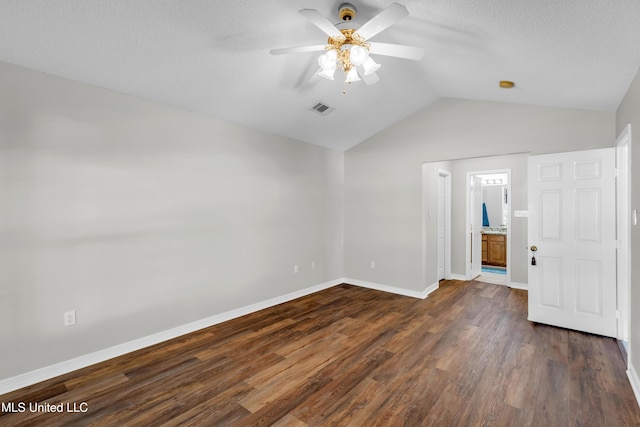 20 Lakeview Dr, Ocean Springs, MS 39564 - unfurnished bedroom featuring lofted ceiling, dark wood-style flooring, a ceiling fan, and a textured ceiling